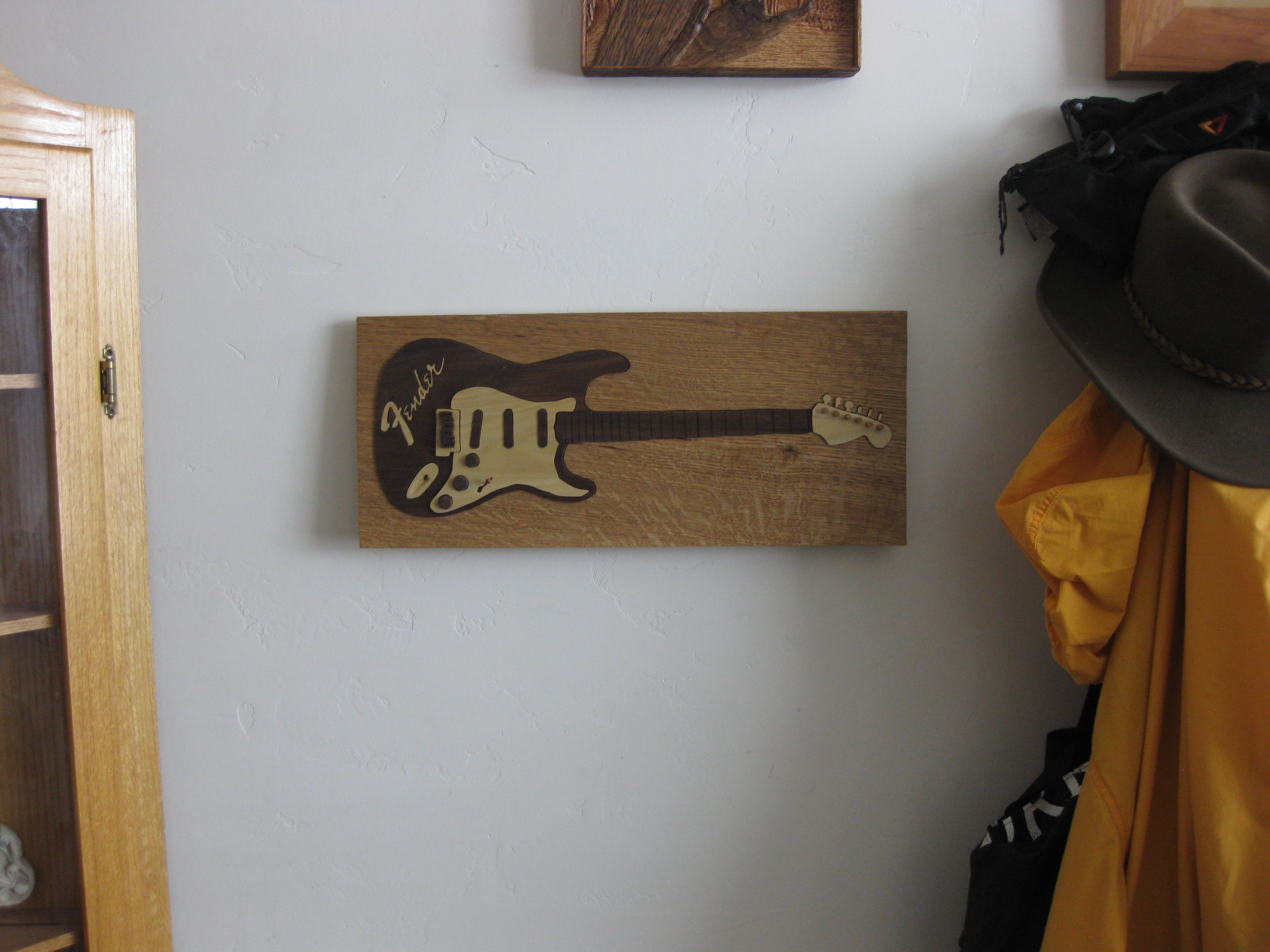 Vintage Fender Puzzle hanging on wall